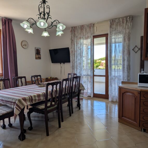 soggiorno cucina con terrazza abitabile e balcone vista mare